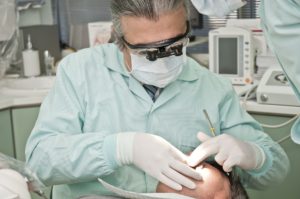 orthodontist in Wigan working on a patient