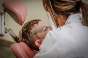 orthodontist in wilmslow working a patient